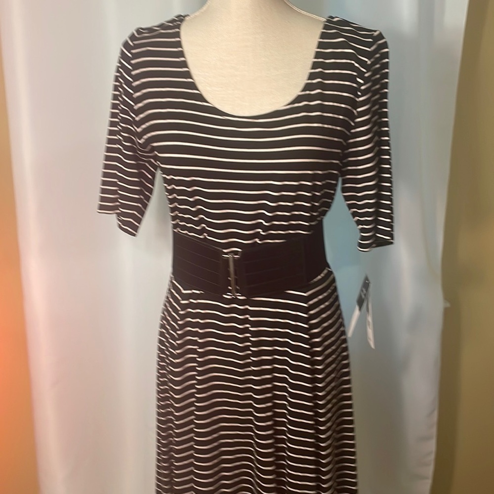 Black and white stripe knit dress. Scoop neck front and back.